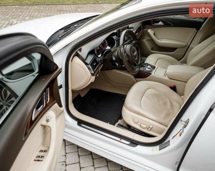 Білий Ауді А6, об'ємом двигуна 1.98 л та пробігом 216 тис. км за 19000 $, фото 28 на Automoto.ua