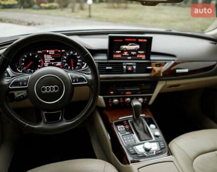 Білий Ауді А6, об'ємом двигуна 1.98 л та пробігом 216 тис. км за 19000 $, фото 48 на Automoto.ua