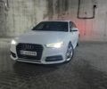 Білий Ауді А6, об'ємом двигуна 2 л та пробігом 134 тис. км за 14706 $, фото 1 на Automoto.ua