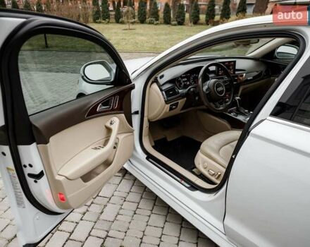 Білий Ауді А6, об'ємом двигуна 1.98 л та пробігом 216 тис. км за 19000 $, фото 26 на Automoto.ua
