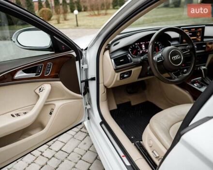 Білий Ауді А6, об'ємом двигуна 1.98 л та пробігом 216 тис. км за 19000 $, фото 32 на Automoto.ua