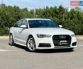 Білий Ауді А6, об'ємом двигуна 1.98 л та пробігом 53 тис. км за 17999 $, фото 1 на Automoto.ua