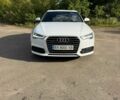 Белый Ауди А6, объемом двигателя 2 л и пробегом 225 тыс. км за 25600 $, фото 1 на Automoto.ua