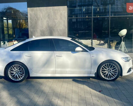 Білий Ауді А6, об'ємом двигуна 1.97 л та пробігом 215 тис. км за 26500 $, фото 1 на Automoto.ua