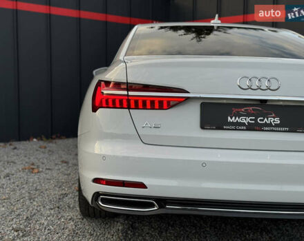 Білий Ауді А6, об'ємом двигуна 2 л та пробігом 56 тис. км за 30990 $, фото 14 на Automoto.ua