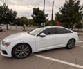 Белый Ауди А6, объемом двигателя 1.98 л и пробегом 56 тыс. км за 38900 $, фото 2 на Automoto.ua