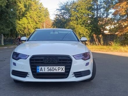 Белый Ауди А6, объемом двигателя 2 л и пробегом 305 тыс. км за 15900 $, фото 1 на Automoto.ua