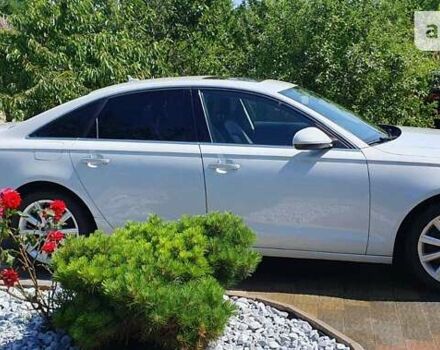 Белый Ауди А6, объемом двигателя 2 л и пробегом 180 тыс. км за 10600 $, фото 1 на Automoto.ua