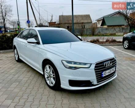 Білий Ауді А6, об'ємом двигуна 2 л та пробігом 147 тис. км за 19900 $, фото 1 на Automoto.ua
