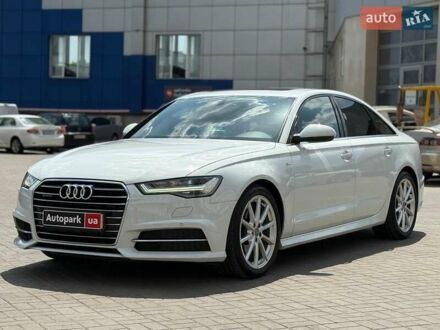 Білий Ауді А6, об'ємом двигуна 2 л та пробігом 75 тис. км за 25990 $, фото 1 на Automoto.ua