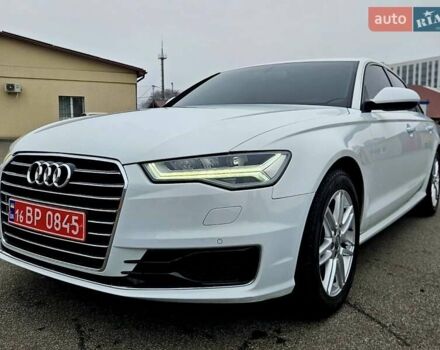 Білий Ауді А6, об'ємом двигуна 2 л та пробігом 120 тис. км за 19900 $, фото 1 на Automoto.ua