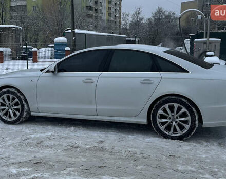 Білий Ауді А6, об'ємом двигуна 2 л та пробігом 210 тис. км за 18900 $, фото 1 на Automoto.ua