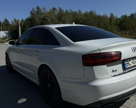 Белый Ауди А6, объемом двигателя 1.98 л и пробегом 200 тыс. км за 12800 $, фото 1 на Automoto.ua