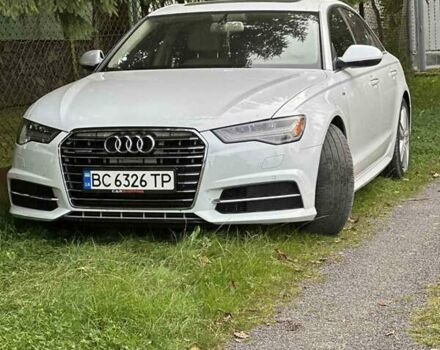 Білий Ауді А6, об'ємом двигуна 1.98 л та пробігом 165 тис. км за 20100 $, фото 1 на Automoto.ua