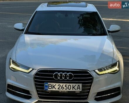 Білий Ауді А6, об'ємом двигуна 1.98 л та пробігом 247 тис. км за 14400 $, фото 1 на Automoto.ua
