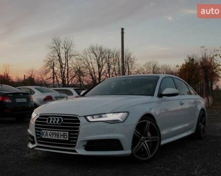 Білий Ауді А6, об'ємом двигуна 1.98 л та пробігом 65 тис. км за 22500 $, фото 1 на Automoto.ua