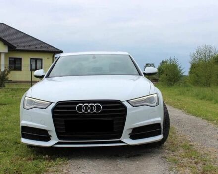 Белый Ауди А6, объемом двигателя 2 л и пробегом 84 тыс. км за 12500 $, фото 1 на Automoto.ua