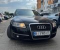 Черный Ауди А6, объемом двигателя 2 л и пробегом 480 тыс. км за 6826 $, фото 1 на Automoto.ua