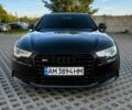 Черный Ауди А6, объемом двигателя 2 л и пробегом 279 тыс. км за 13079 $, фото 1 на Automoto.ua