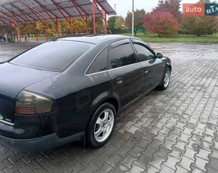 Черный Ауди А6, объемом двигателя 2.39 л и пробегом 331 тыс. км за 3700 $, фото 9 на Automoto.ua