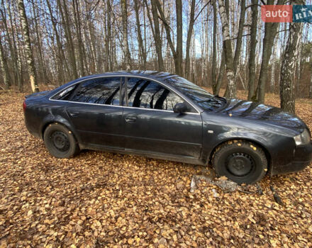 Черный Ауди А6, объемом двигателя 2.4 л и пробегом 390 тыс. км за 3600 $, фото 1 на Automoto.ua