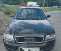 Черный Ауди А6, объемом двигателя 1.8 л и пробегом 406 тыс. км за 5600 $, фото 1 на Automoto.ua