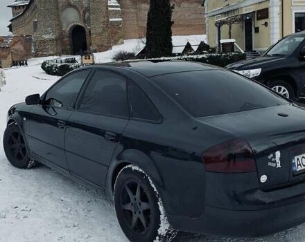 Черный Ауди А6, объемом двигателя 2.5 л и пробегом 305 тыс. км за 4500 $, фото 1 на Automoto.ua