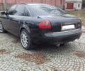 Черный Ауди А6, объемом двигателя 2.4 л и пробегом 300 тыс. км за 3500 $, фото 1 на Automoto.ua