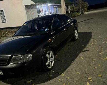 Черный Ауди А6, объемом двигателя 1.8 л и пробегом 270 тыс. км за 3500 $, фото 1 на Automoto.ua