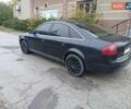 Черный Ауди А6, объемом двигателя 1.78 л и пробегом 300 тыс. км за 3000 $, фото 1 на Automoto.ua