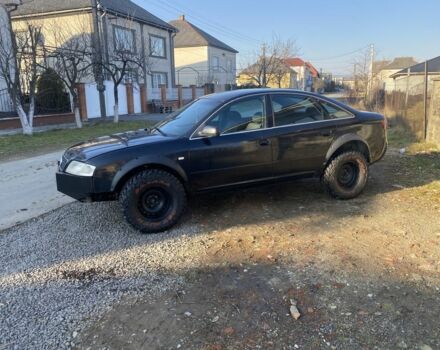 Черный Ауди А6, объемом двигателя 2.4 л и пробегом 262 тыс. км за 3000 $, фото 1 на Automoto.ua