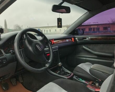 Черный Ауди А6, объемом двигателя 1.9 л и пробегом 256 тыс. км за 3800 $, фото 1 на Automoto.ua