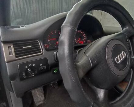 Черный Ауди А6, объемом двигателя 1.8 л и пробегом 300 тыс. км за 4800 $, фото 1 на Automoto.ua
