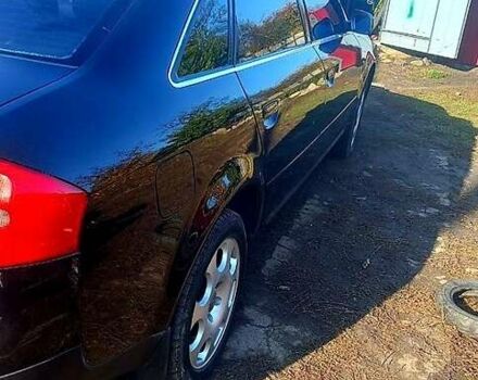 Черный Ауди А6, объемом двигателя 1.8 л и пробегом 300 тыс. км за 4500 $, фото 1 на Automoto.ua