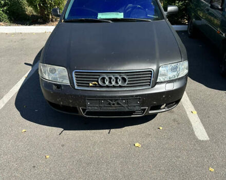 Черный Ауди А6, объемом двигателя 1.8 л и пробегом 320 тыс. км за 5200 $, фото 1 на Automoto.ua