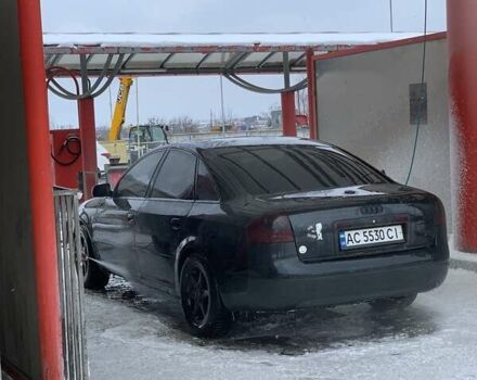 Черный Ауди А6, объемом двигателя 2.5 л и пробегом 305 тыс. км за 4500 $, фото 3 на Automoto.ua