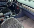 Черный Ауди А6, объемом двигателя 1.8 л и пробегом 300 тыс. км за 4000 $, фото 1 на Automoto.ua