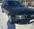 Черный Ауди А6, объемом двигателя 2.5 л и пробегом 300 тыс. км за 4000 $, фото 1 на Automoto.ua