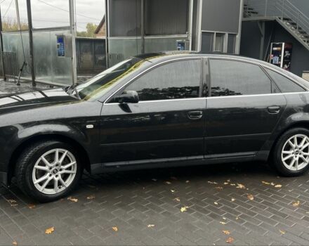 Черный Ауди А6, объемом двигателя 2.5 л и пробегом 328 тыс. км за 4100 $, фото 1 на Automoto.ua
