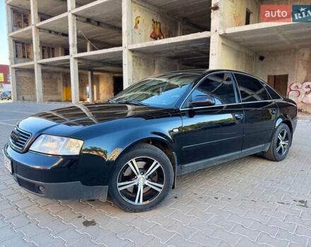 Черный Ауди А6, объемом двигателя 2.4 л и пробегом 290 тыс. км за 5500 $, фото 1 на Automoto.ua