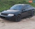 Черный Ауди А6, объемом двигателя 1.8 л и пробегом 300 тыс. км за 4000 $, фото 1 на Automoto.ua