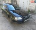 Черный Ауди А6, объемом двигателя 2.8 л и пробегом 318 тыс. км за 6300 $, фото 1 на Automoto.ua