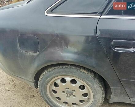 Черный Ауди А6, объемом двигателя 2.5 л и пробегом 289 тыс. км за 2999 $, фото 1 на Automoto.ua