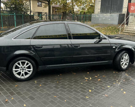 Черный Ауди А6, объемом двигателя 2.5 л и пробегом 328 тыс. км за 4100 $, фото 11 на Automoto.ua