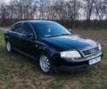 Черный Ауди А6, объемом двигателя 1.8 л и пробегом 275 тыс. км за 5000 $, фото 1 на Automoto.ua