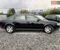 Черный Ауди А6, объемом двигателя 2.4 л и пробегом 250 тыс. км за 2999 $, фото 1 на Automoto.ua