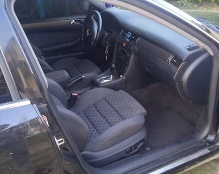 Черный Ауди А6, объемом двигателя 2.5 л и пробегом 349 тыс. км за 1900 $, фото 4 на Automoto.ua