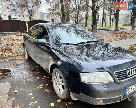 Черный Ауди А6, объемом двигателя 2.5 л и пробегом 325 тыс. км за 4200 $, фото 1 на Automoto.ua