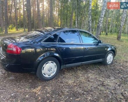 Черный Ауди А6, объемом двигателя 2.4 л и пробегом 230 тыс. км за 3700 $, фото 4 на Automoto.ua