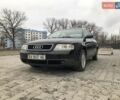 Черный Ауди А6, объемом двигателя 1.8 л и пробегом 257 тыс. км за 5500 $, фото 1 на Automoto.ua
